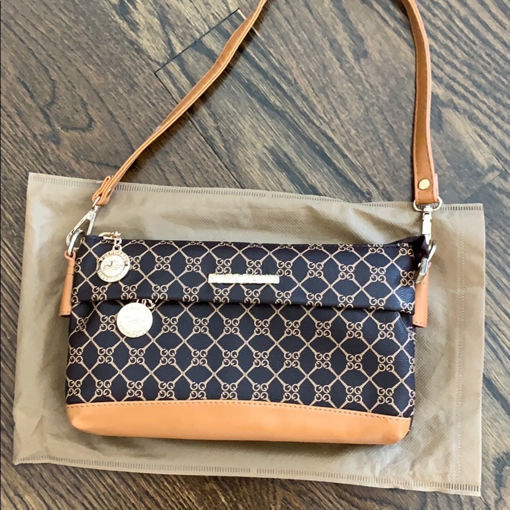NWOT Fuerdanni hand bag! Genuine leather.